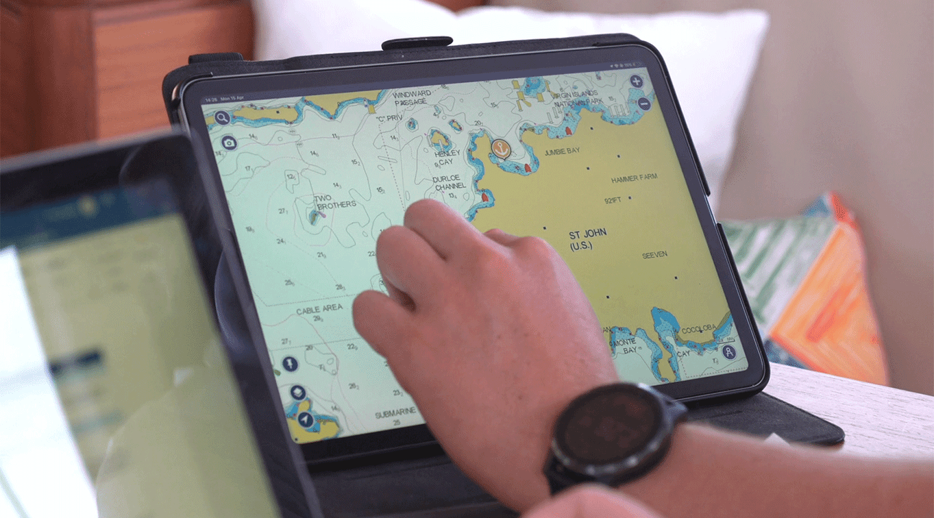 Navigating with Navionics on a tablet aboard a charter yacht